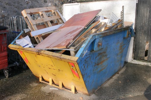 Skip delivery vehicle unloading waste in Haringey
