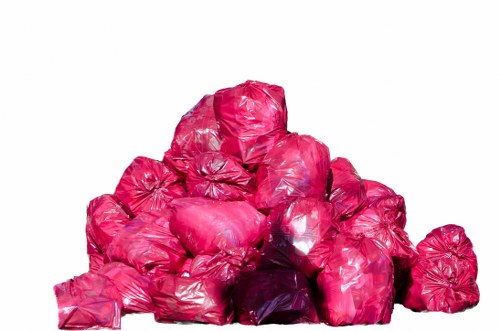 Business professional managing waste with a commercial skip