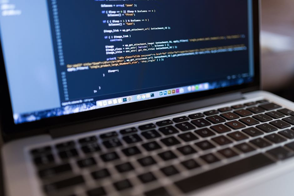 The image displays a close-up view of a computer screen showing lines of code with syntax highlighting in various colors such as yellow, blue, purple, and green. The code appears to be CSS styling det